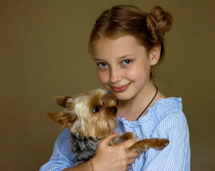 little girl with yorkshire terrier