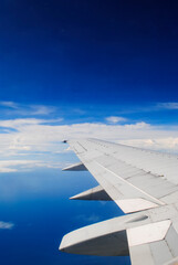 Clouds and sky from airplane window view