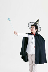 boy holding a magic wand