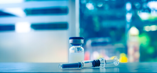 Vaccine coronavirus deverlopment vial dose flu shot drug needle syringe,medical concept vaccination hypodermic injection treatment disease care hospital prevention immunization illness disease.