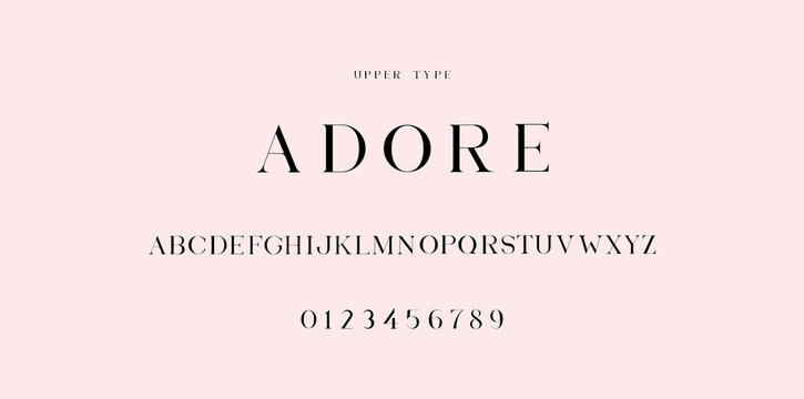 "Adore" font uppercase. EPS 10 Included. Stylish and Elegant alphabet. Numerals included. 