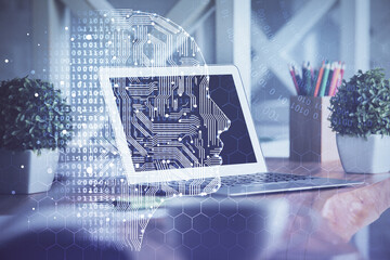 Double exposure of desktop computer and human brain drawing hologram. Ai concept.