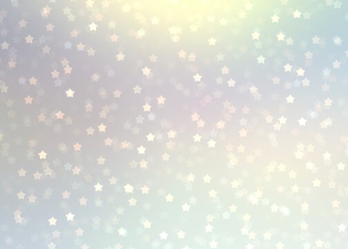 Stars bokeh fly on pastel holographic pearl blur background. Winter holidays decorative background.