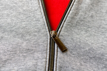 Metal zipper on the sports jacket. Close up. Selective focus. © Aliaksandr