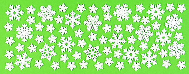 Banner Set of white snowflakes on colorful background. Top view of Christmas ornament. New Year time concept with empty space for your design