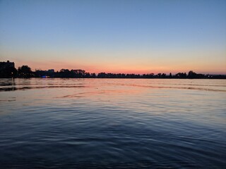 Obraz premium sunset over the river