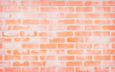Background of wide old red brick wall texture. Old Orange brick wall concrete or stone wall textured, wallpaper limestone abstract flooring/Grid uneven interior rock. Home or office design backdrop.