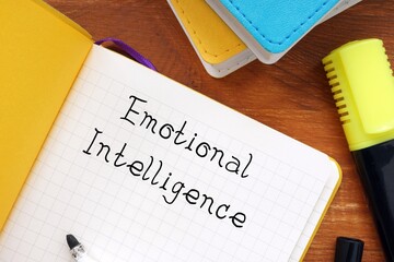 Financial concept meaning Emotional Intelligence with phrase on the page.