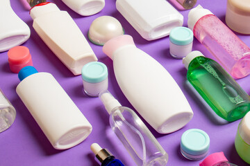 Group of plastic bodycare bottle Flat lay composition with cosmetic products on colored background empty space for you design. Set of White Cosmetic containers, top view with copy space