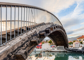 Old wooden arched bridge over the river in Trogir, Croatia