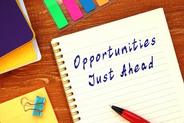 Financial concept about Opportunities Just Ahead with phrase on the page.