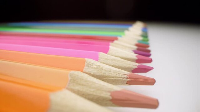 Motorized moving shot of colour pencils, shot with macro probe lens