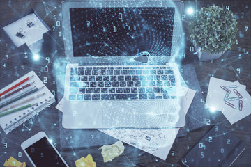 Multi exposure of work space with computer and human brain hologram. Brainstorm concept.