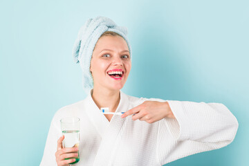 Brushing teeth in bathroom. Teeth Care. Hygiene. Dental higiene. Oral care. Ceaning teeth. Morning routine.