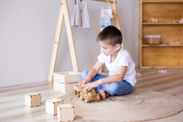 child plays alone in his bright room