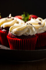 Red Velvet Cupcakes. Detailed closeup macro food background.