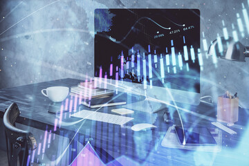 Stock market graph and table with computer background. Multi exposure. Concept of financial...