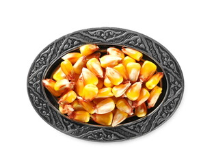 Corn kernels in decorative metal bowl isolated on white background, top view