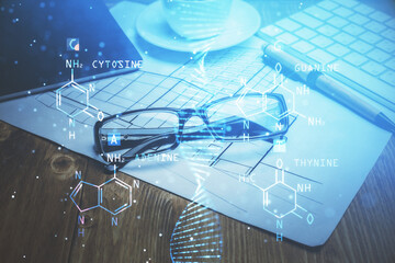 DNA drawing with glasses on the table background. Concept of bioengineering. Double exposure.