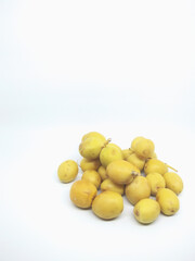 fresh yellow dates isolated on white background 