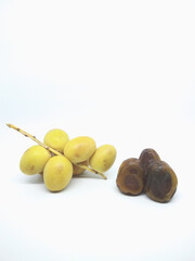 yellow and brown dates isolated on white background