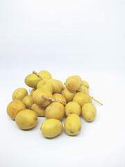 fresh yellow dates isolated on white background 