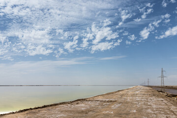salt lake with simple dirt road