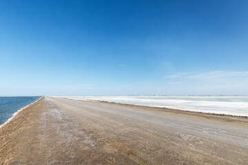 salt lake landscape and dirt road