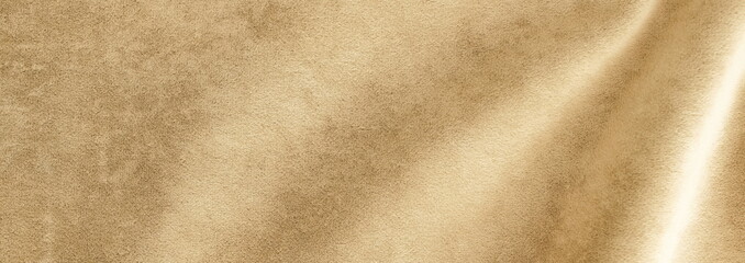 velvet texture beige color background, expensive luxury fabric, material,  wallpaper. copy space. Cocoon pantone color 2025