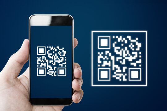 QR code scanning payment and verification. Hand using mobile smart phone scan QR code