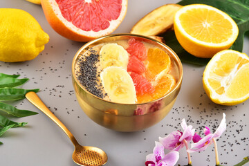 Concept on a gray background. Tropical fruits. Frame.	