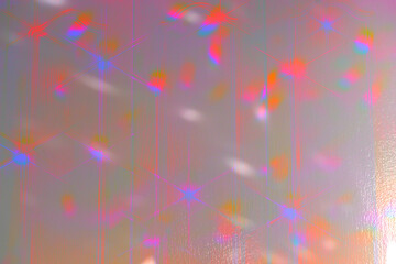 Vibrant splashes of orange, blue and pink on a pearl background
