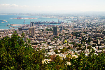 Fototapeta na wymiar Sunny summer view of port, Haifa city from Louis Promenade