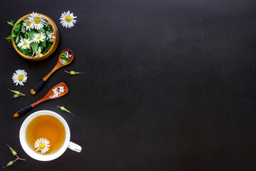 Herbal tea - green herbs and wild flowers, top view