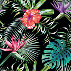 Beautiful exotic tropical plants and hibiscus, bird of paradise flowers seamless vector pattern on black background