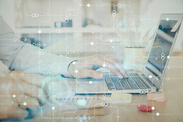 Businessman working on Laptop with technology theme drawing. Concept of big data. Double exposure.