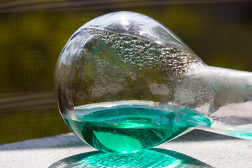 Laboratory glassware with green color reagents