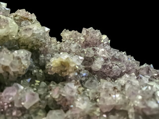 Detailed view of mineral stone, amethyst quartz druze with rutile inclusions