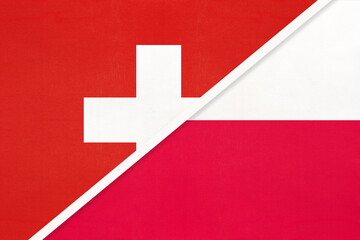 Obraz premium Switzerland and Poland, symbol of national flags from textile. Championship between two countries.