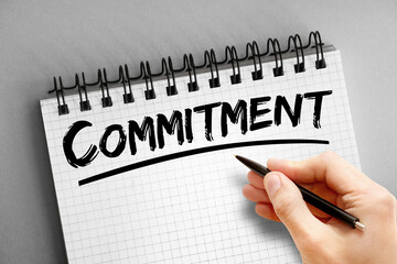 Text note - Commitment, business concept on notepad
