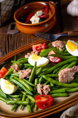 Rustic green bean salad with egg and tuna