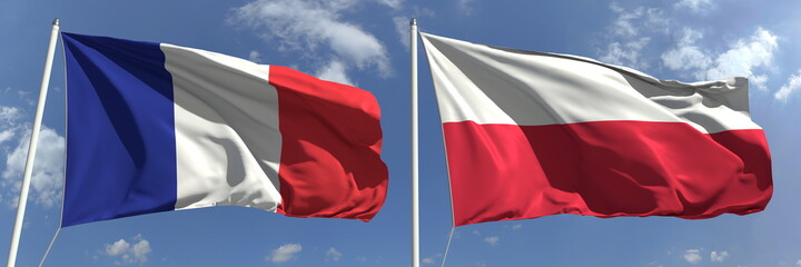 Flying flags of France and Poland on high flagpoles. 3d rendering