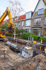 Sewerage works in a residential area: placing sewer pipes
