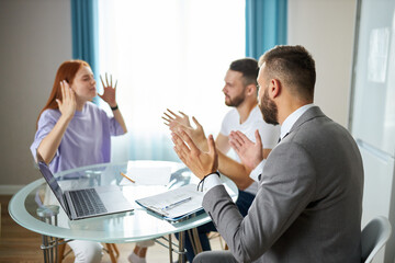 young caucasian family expain situation, problems to family psychologist. professional therapist attentively listen to them, try to help, give advices. last chance to save the family