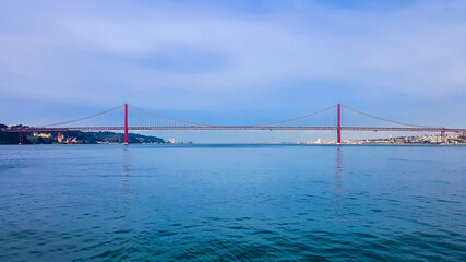 Fototapeta premium 25th of April Suspension Bridge over the Tagus river in Lisbon, Portugal