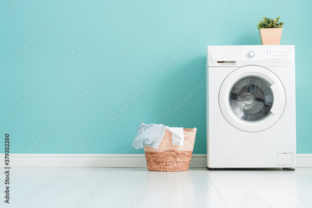 Canvas Prints washing machine on teal wall background