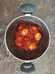 closeup of a dish with a bowl isolated on a granite surface