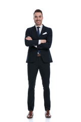 Cheerful businessman laughing with hands folded