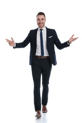 Cheerful businessman smiling and welcoming while stepping