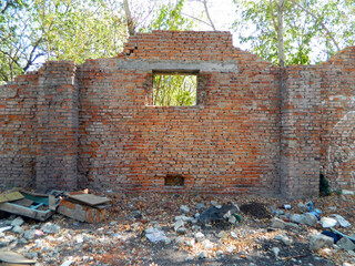 destroyed old red brick walls